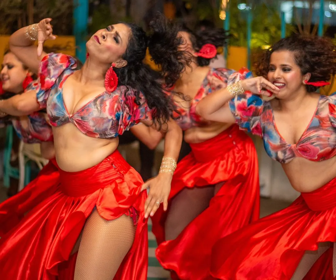 Nothing beats the adrenaline of performing on stage with my amazing ladies team. This shot captures the power, expression, and pure joy of our Salsa routine.