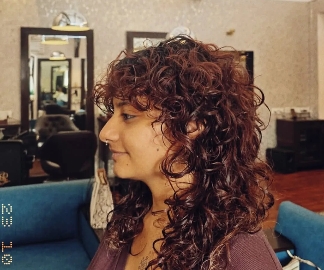 I have a special love for curly hair. This tailored cut was designed to enhance the natural curl pattern, creating beautiful definition and bounce without sacrificing length.