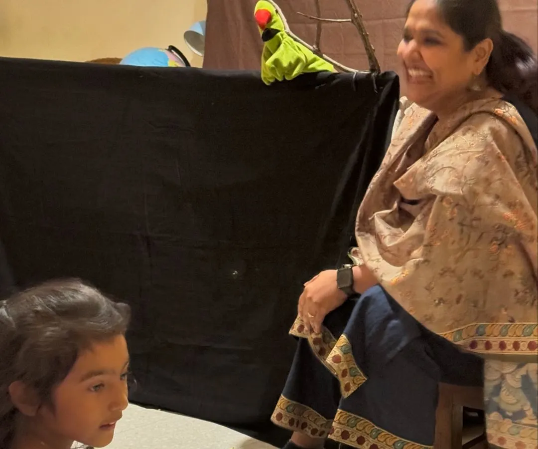 The joy of performing for children is unmatched. Here I am at a birthday party, sharing stories with a little friend and a puppet. These musical sessions for kids are always filled with laughter, interaction, and happy surprises.