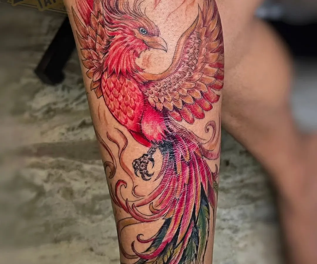A phoenix represents rebirth and resilience, and I used a vibrant red and orange palette to bring that fiery energy to life. This watercolor style tattoo was designed to flow with the calf muscle, making the phoenix appear as if it's rising in motion.