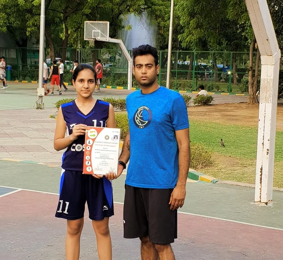 We are incredibly proud of our dedicated players. Here is our trainee, Priyanshi J., holding her certificate after representing Delhi state in the Under 16 Girls National Championship. Her hard work is an inspiration to everyone at the academy.