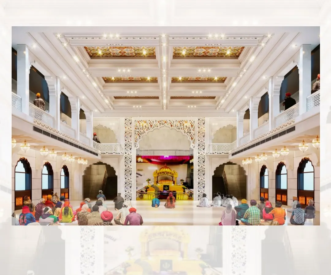 The main prayer hall at Tilak Nagar Gurudwara in Delhi, designed to be a sanctuary of peace. Our design uses soaring arches, detailed coffered ceilings, and soft, layered lighting to create a space that is both grand and deeply tranquil for the congregation.