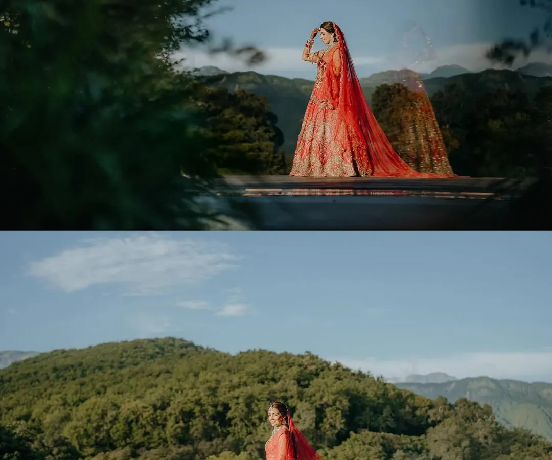 A bride deserves to feel like she's on top of the world. I used the stunning mountain landscape of Dehradun to frame this bridal portrait, letting her vibrant red lehenga and the flowing veil create a breathtaking contrast against the serene hills.