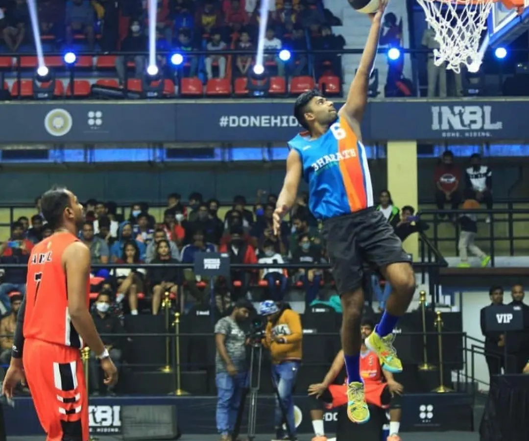 I don't just coach the game, I still play it at a high level. Here I am driving for a layup during the INBL 3x3 tournament. This is the kind of real-game experience and intensity I bring to my coaching.