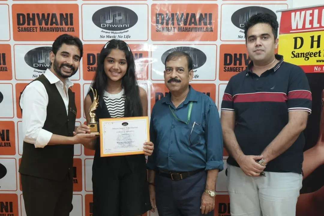 Our instructors and gurus with a talented student. This highlights the supportive Guru-Shishya relationship that is central to our teaching philosophy, ensuring personalized guidance in your fitness journey.