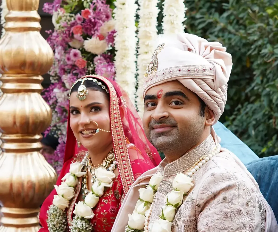 A beautiful, candid moment of the happy couple, Priyanka and Ashish, during their wedding ceremony. We believe in creating a backdrop so perfect that the couple's joy naturally becomes the centerpiece of the day.