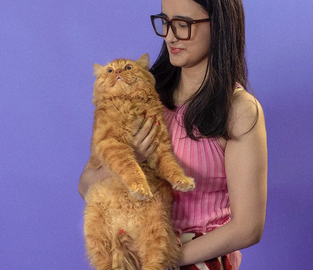 For commercial shoots, we create a fun and comfortable atmosphere for both pets and their humans. Here, we captured a moment of genuine connection between a model and a fluffy Persian cat for a vibrant brand campaign.