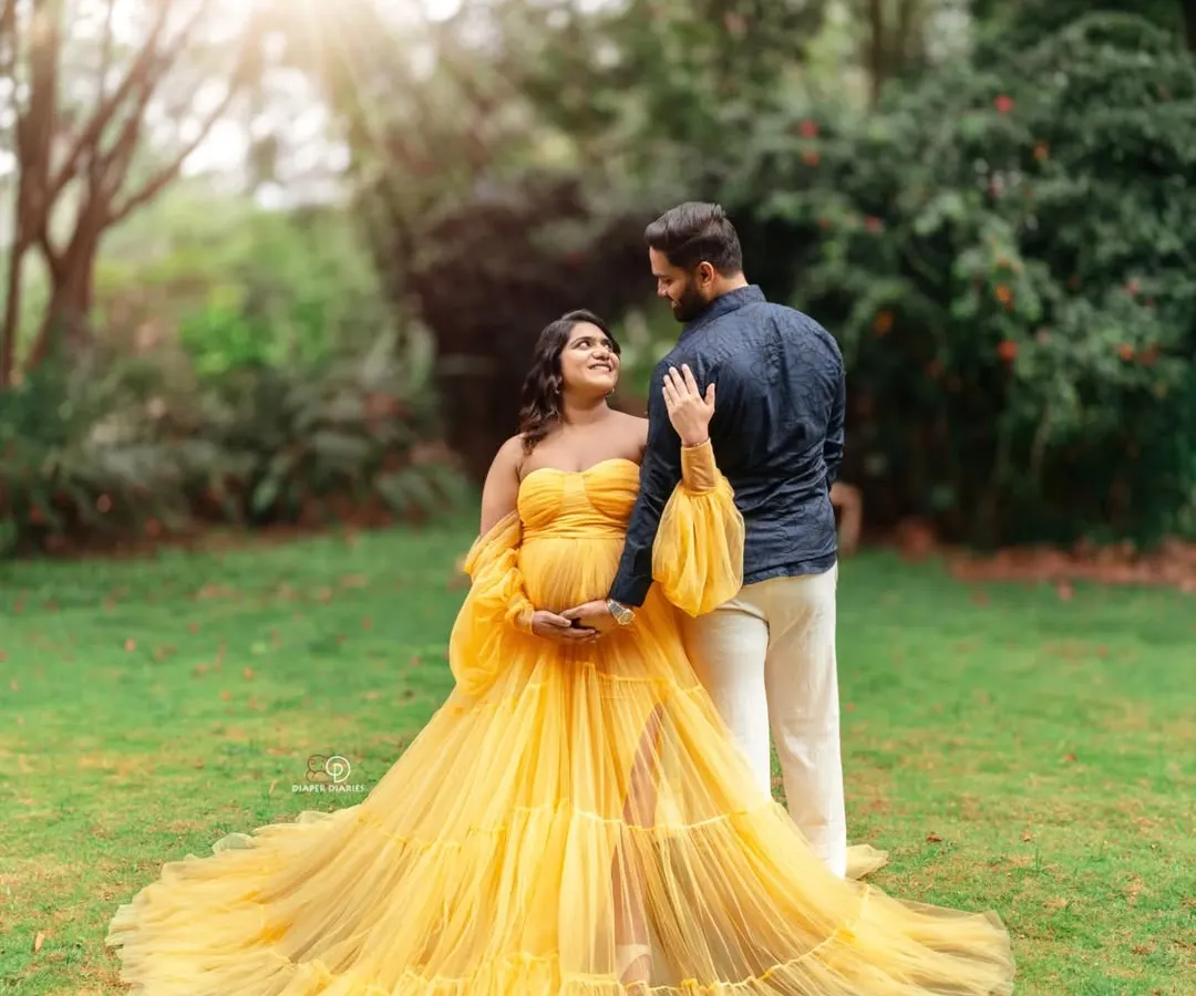 A fairytale moment for this mom-to-be. We found the perfect light for this outdoor maternity session, letting her beautiful yellow gown and the natural surroundings create pure magic.