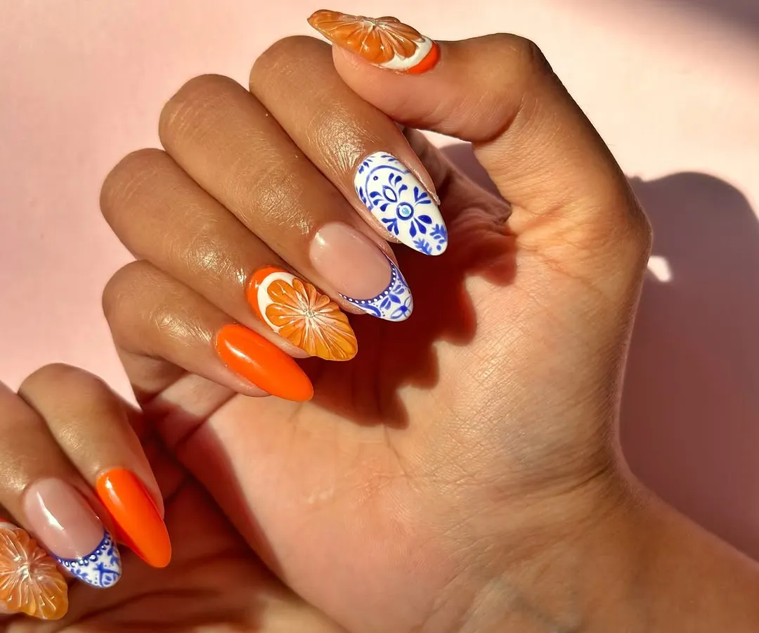 Bring me your inspiration and I'll make it happen. This set was inspired by Mediterranean tile art, featuring hand-painted blue and white patterns paired with juicy, 3D sculpted orange slices for a perfect summer vibe.