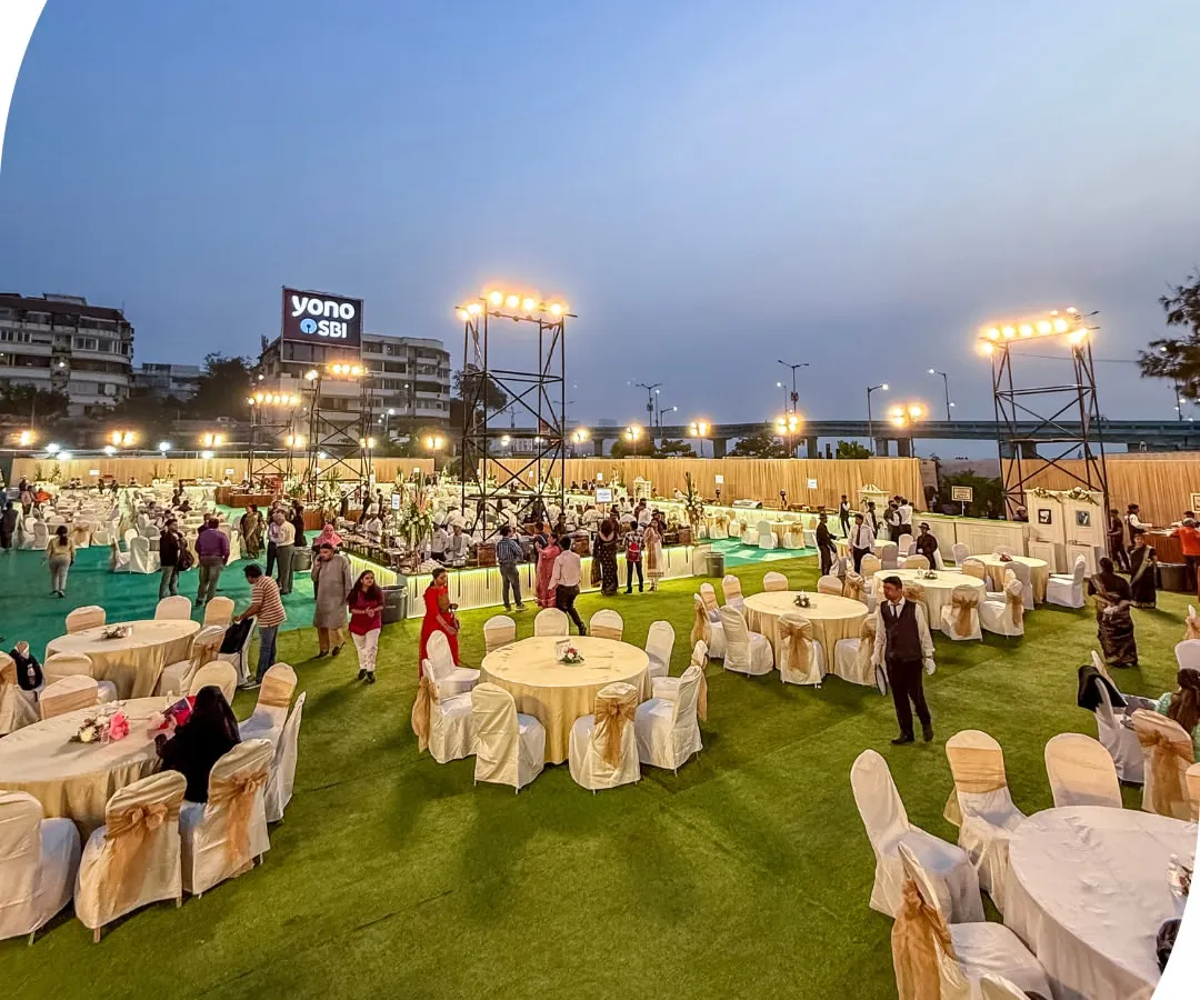 This is the scale we operate on. A sprawling outdoor setup for a grand celebration, where we ensured every one of the thousands of guests experienced impeccable service and delicious food. We transform any open space into a magnificent banquet.