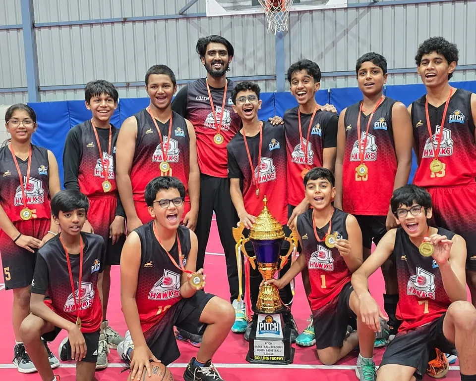 The ultimate goal. Here are our Pitch Hawks, champions of the Youth League Season 2, celebrating their hard-earned victory with the championship trophy.