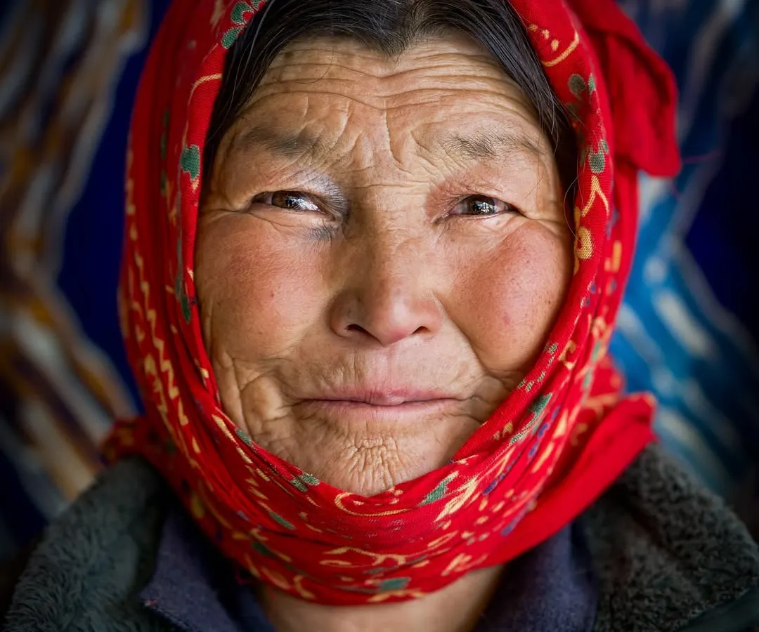 A portrait of a Ladakhi woman, her face a beautiful map of a life lived with resilience and grace. Shot in her village using only natural light, this image seeks to convey the quiet strength and deep-rooted culture of the Himalayan people.