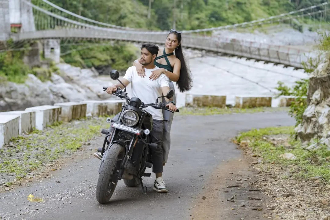 For the adventurous souls, a pre-wedding shoot in the mountains is an unforgettable experience. Here we are in Uttarakhand, using the winding roads and a classic bike to tell a story of a journey they're taking together.