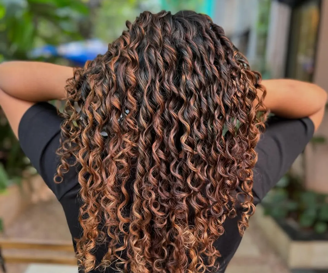 Letting these gorgeous curls live their best life. I gave them a fresh cut and a non-bleach color to define the pattern and add dimension. Look at that bounce. (No filter)