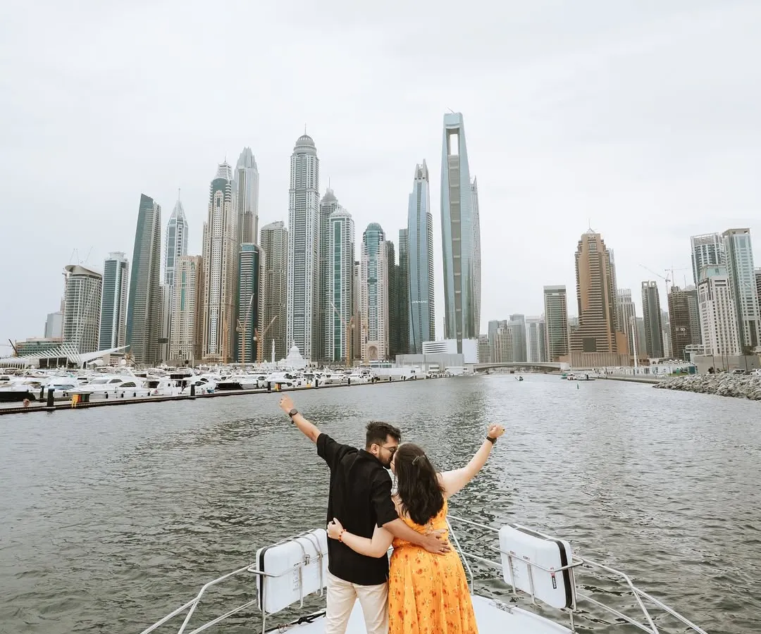 Celebrating their love on a private yacht, with the magnificent Dubai skyline as their witness. This shot captures the joy and grandeur of a destination pre-wedding adventure, a memory of them against the world.