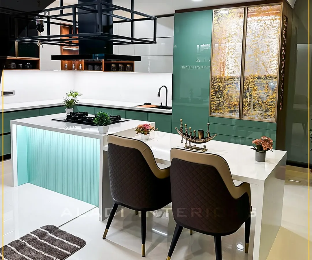 This modern kitchen is the heart of the home, featuring a mint-green island with an integrated cooktop and a breakfast bar. The design combines functionality with style, including a custom overhead rack for storage and display, and high-end quilted dining chairs.