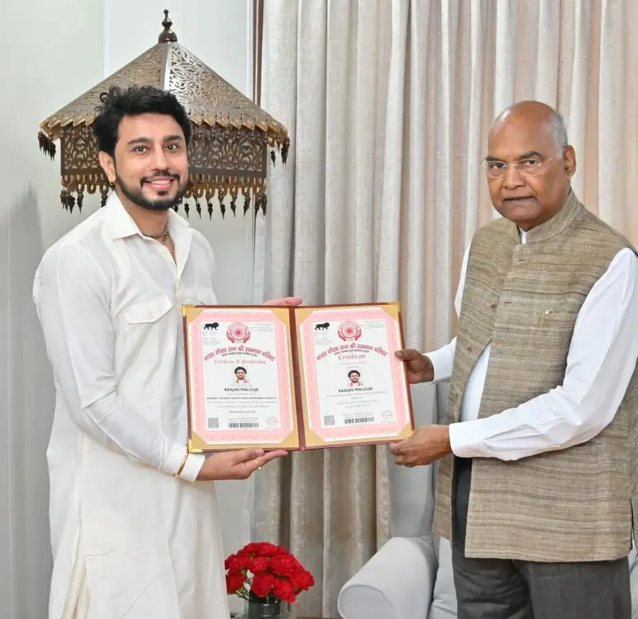 A cherished moment as I receive the Bharat Gaurav Ratna from the former President of India, Shri Ram Nath Kovind. This recognition is a blessing from my Thakur Ji and a testament to my art.
