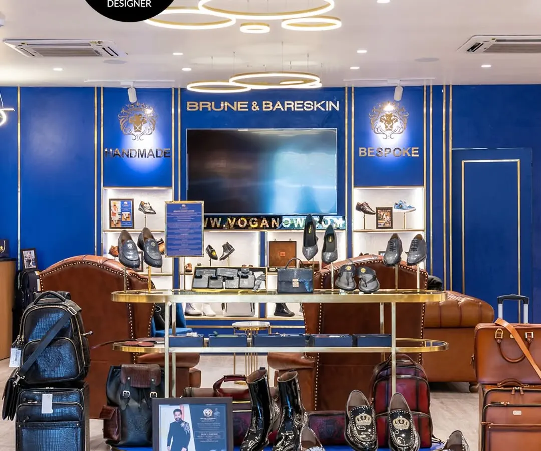 The Brune & Bareskin flagship store is an immersion in luxury. We used a palette of royal blue and polished brass, with bespoke lighting and display units, to create a retail experience that is both grand and intimate.
