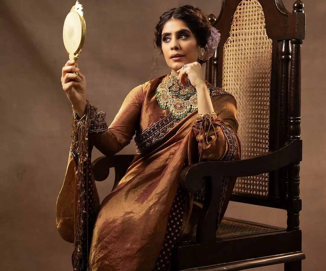 This portrait, shot for a collaboration between Jayanti Reddy Label and Kishandas Jewellery, is all about capturing a mood of regal elegance. I used soft, directional lighting to sculpt the model's features and bring out the rich textures of the silk saree and the exquisite detail of the heritage jewellery.