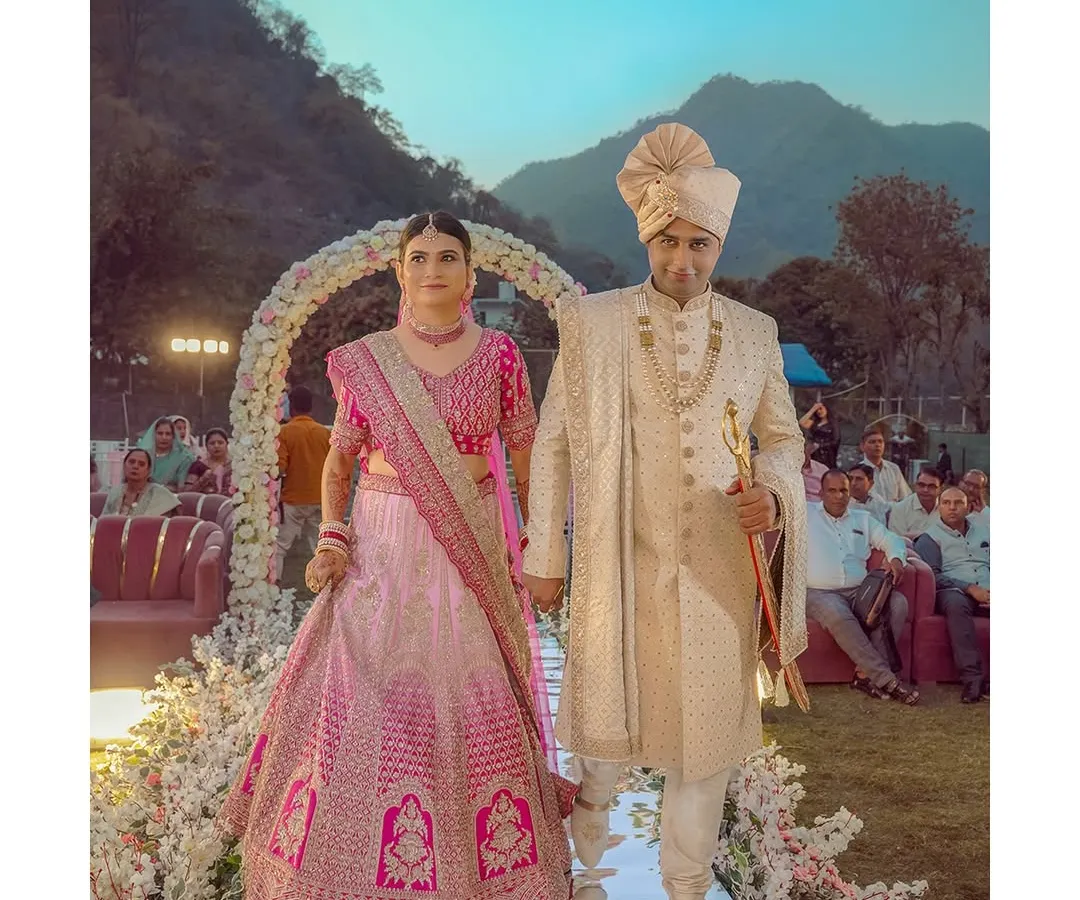 A grand beginning for a grand story, set against the majestic mountains of Rishikesh. I love finding these picture-perfect frames for my couples, making their destination wedding feel like a scene straight out of a movie.