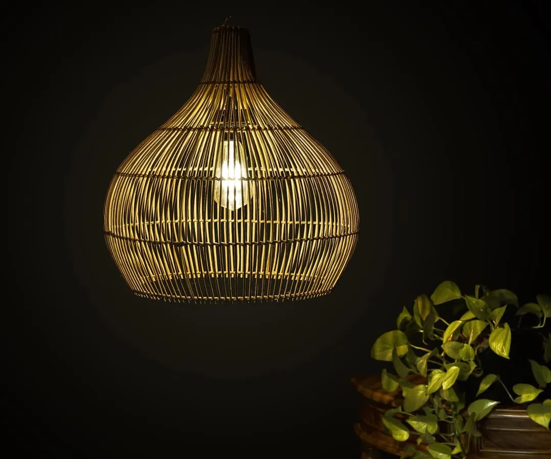 Here is the quintessential warm glow of a natural bamboo lamp. This teardrop pendant is one of my most beloved designs, perfect for casting soft, diffused light over a dining table or in a reading nook.