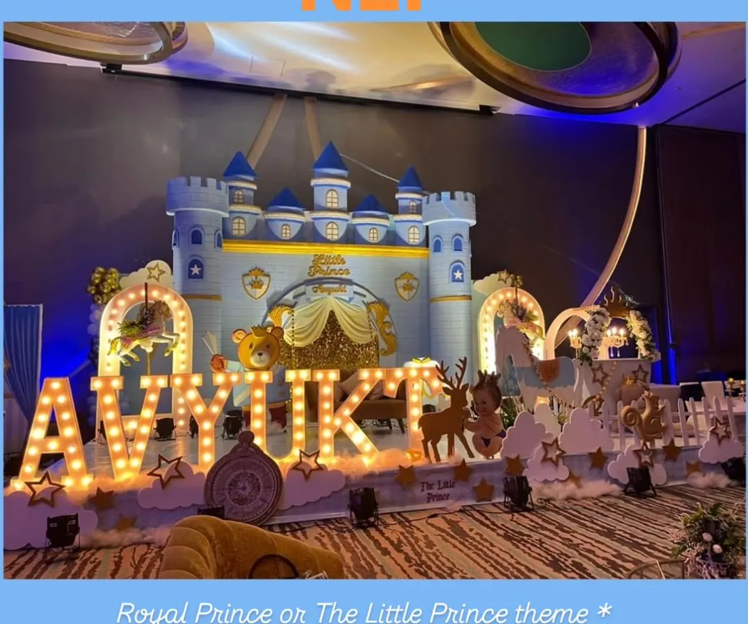 For a truly royal celebration, we built this detailed prince's castle stage, complete with marquee lights spelling out the birthday boy's name and charming woodland creature props.