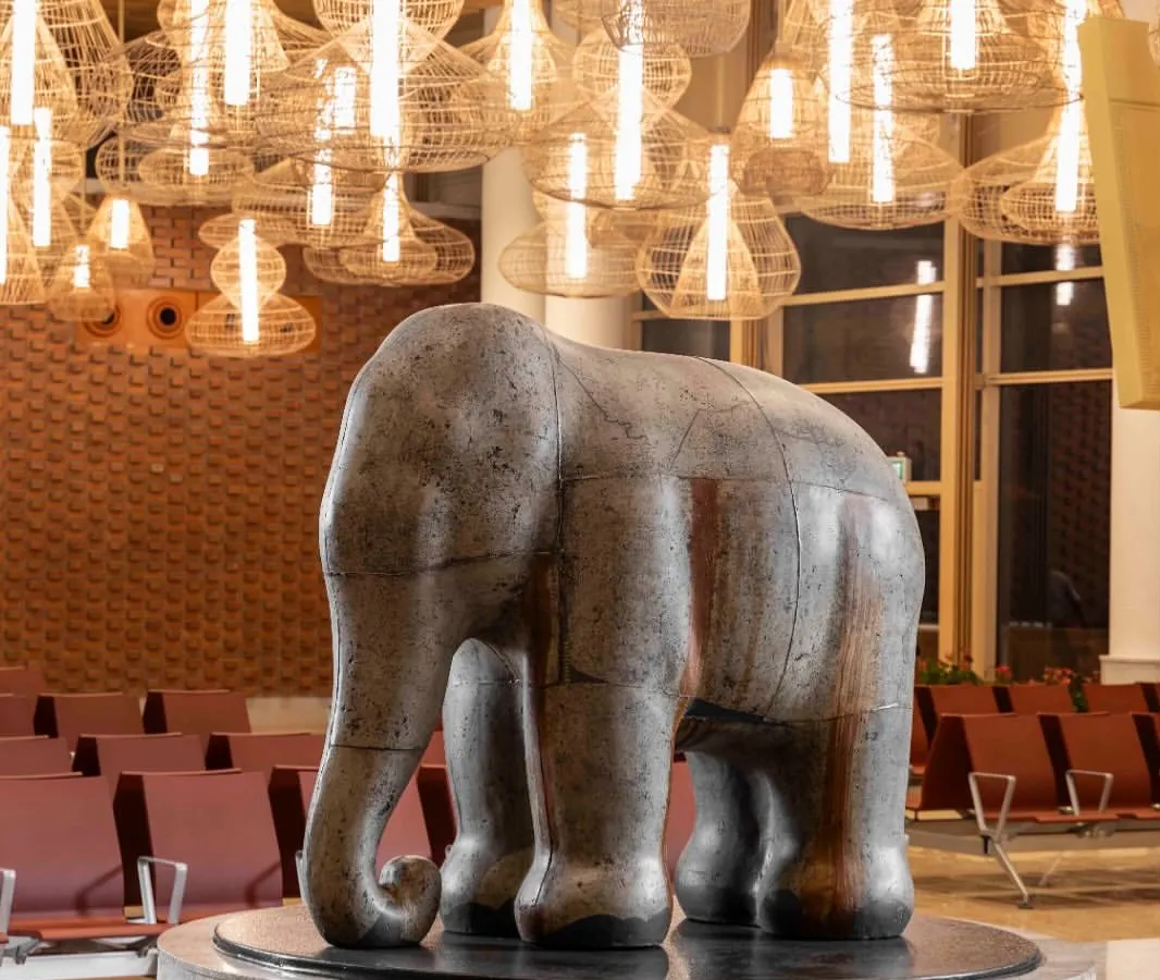 Arunkumar H. G.'s monumental sculpture 'Impinged II', crafted from recycled paper pulp, now resides at Terminal 2 of Kempegowda International Airport, Bengaluru. This acquisition showcases our commitment to placing significant contemporary Indian art in major public spaces.