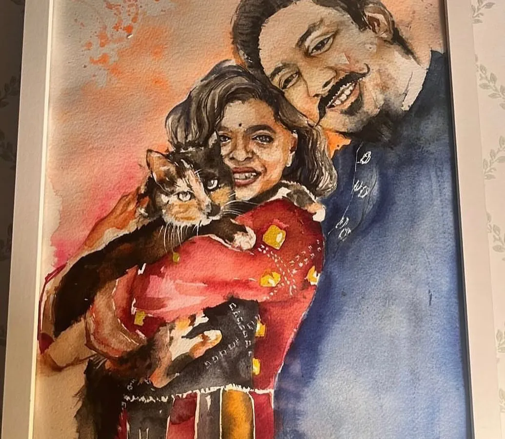 A heartwarming commissioned watercolor portrait for a lovely couple and their adorable cat. I love capturing the unique bond between people and their pets, creating a family keepsake that will be cherished for years.
