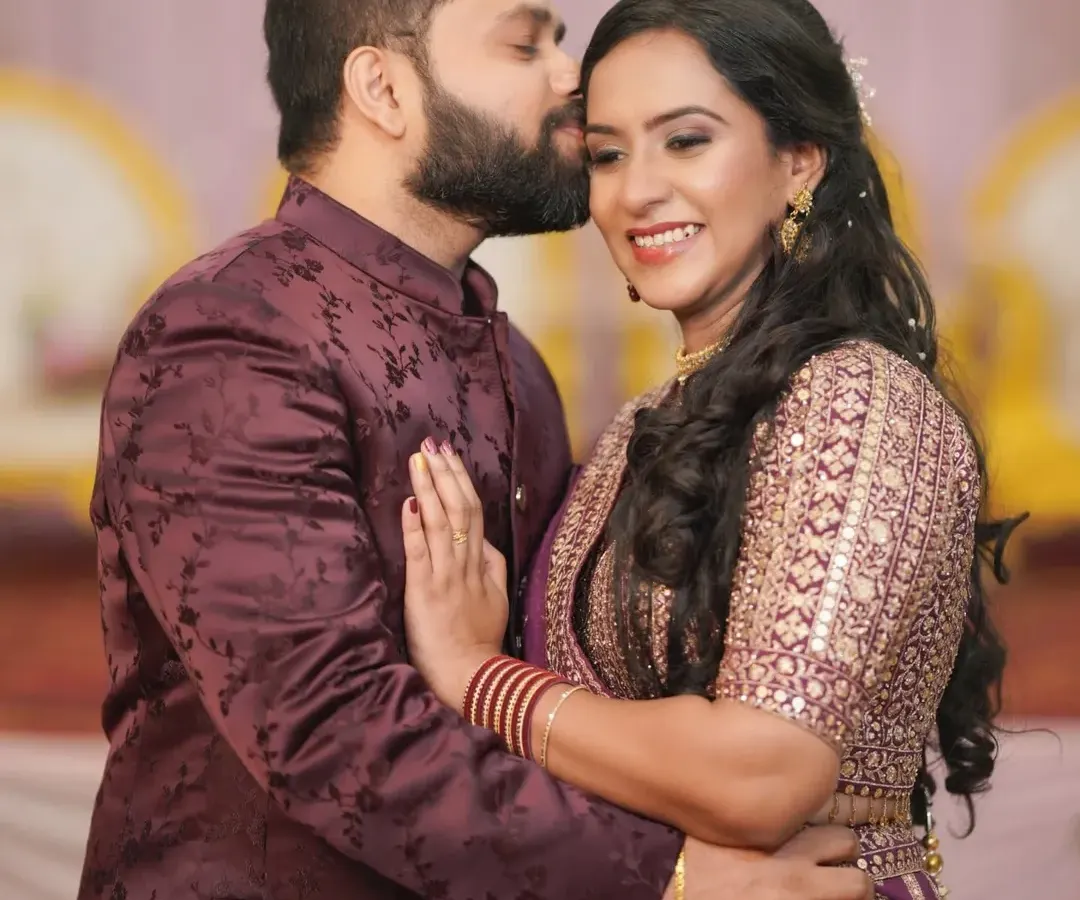 A tender, candid moment during an engagement ceremony. We focus on capturing the genuine emotions and quiet interactions that make your celebration unique, preserving the real feelings of the day.