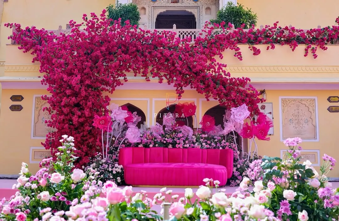 Drenched in 'gulabi' glam. This explosion of bougainvillea against a heritage palace backdrop was for a Mehendi that was anything but ordinary. It’s a whole vibe, a floral fantasy brought to life.