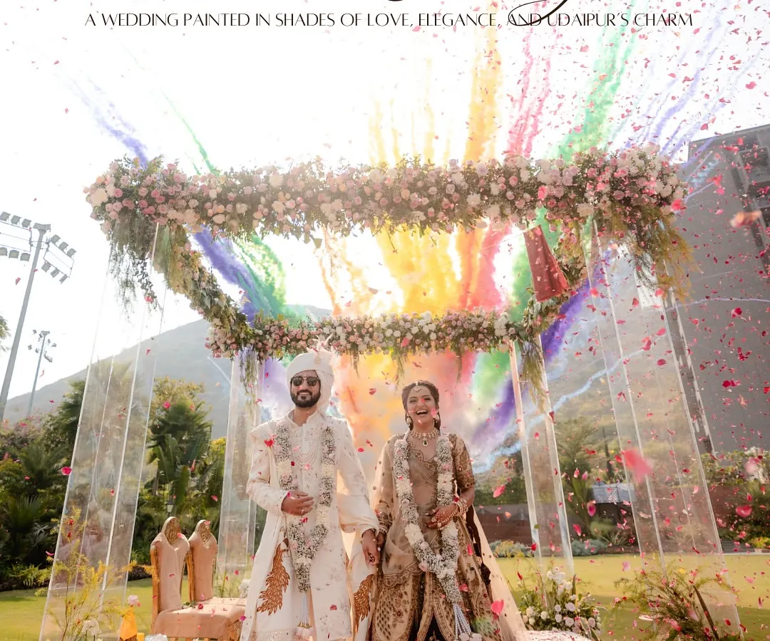 A destination wedding in Udaipur is a whole vibe. We created this epic moment with a burst of color against the palace backdrop, making their varmala feel like a scene from a movie.
