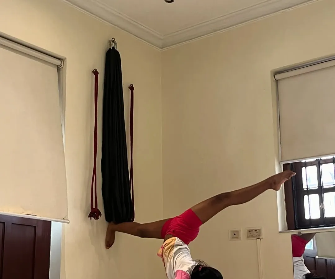 Here's a young student demonstrating incredible progress in our kids' flexibility training. This wall-assisted split handstand shows the strength and control we build in our gymnastics and flexibility programs for children in Kolkata.