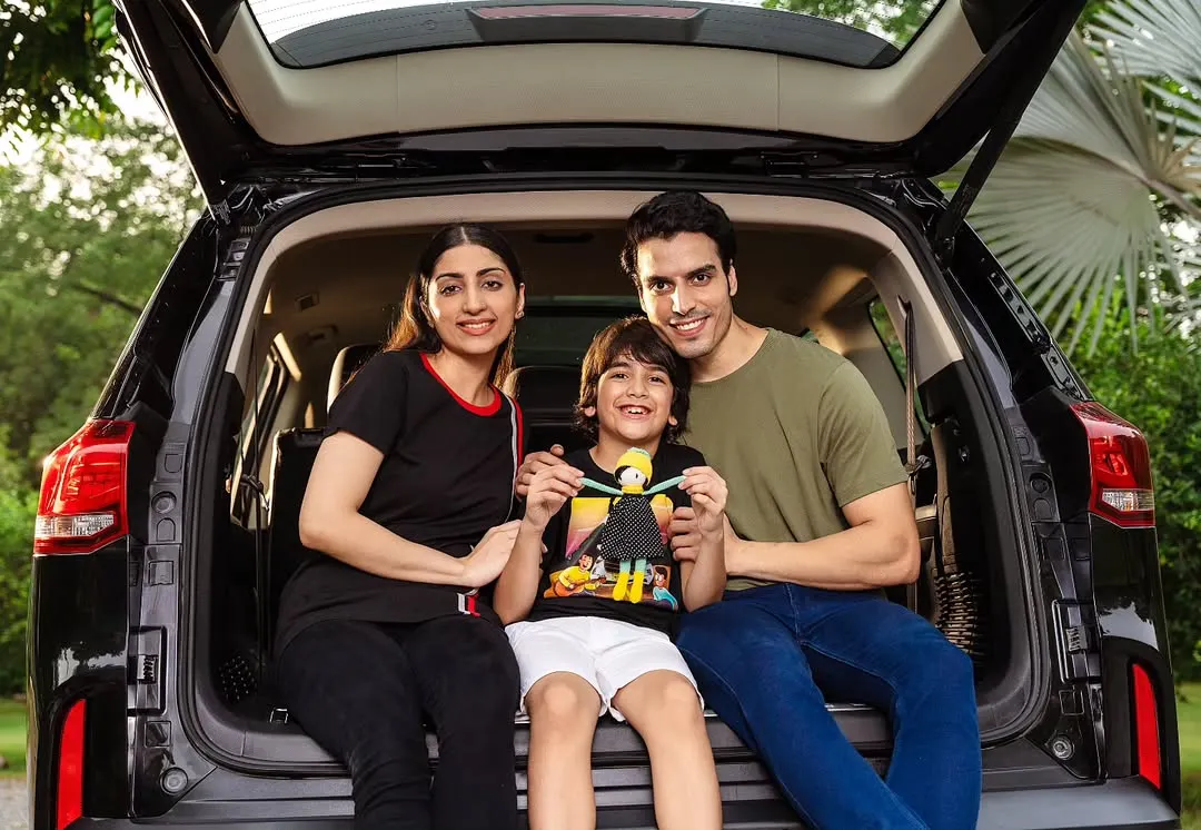 An authentic family moment captured for an MG Motor lifestyle campaign. This shot focuses on creating a relatable, aspirational scene that connects the brand with the joy of family road trips.