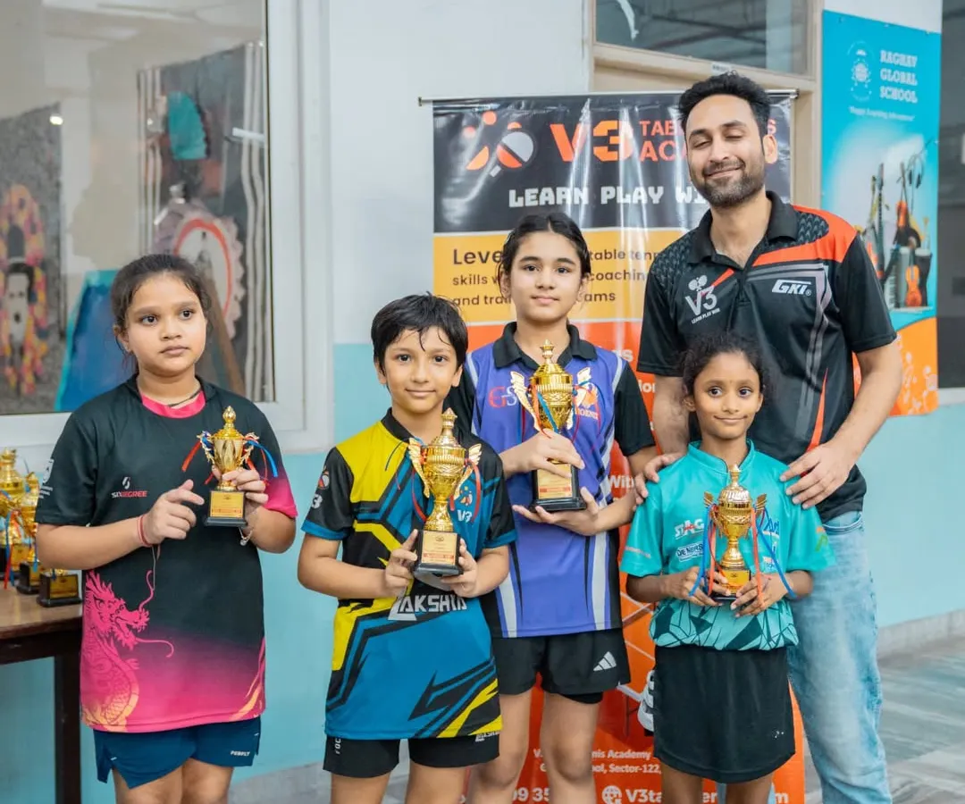 Nothing makes me prouder than seeing my students with their well-earned trophies. This picture captures the joy and success from our recent tournament, a testament to their dedication.