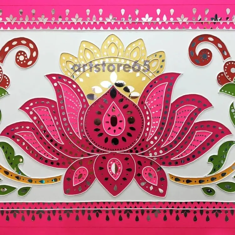 A close-up of a modern lotus motif, handcrafted with bright pinks and intricate mirror placement. This style of Lippan wall decor is perfect for adding a contemporary yet traditional touch to living rooms or commercial spaces.