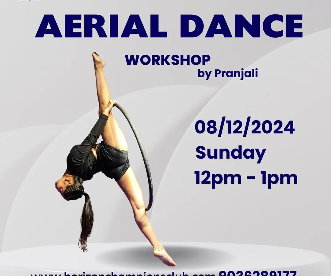 This is what we work towards: a moment of pure strength, flexibility, and grace suspended in the air. This pose on the aerial hoop, or Lyra, demonstrates the control and artistry that you can achieve through our training, blending athletic discipline with expressive dance.