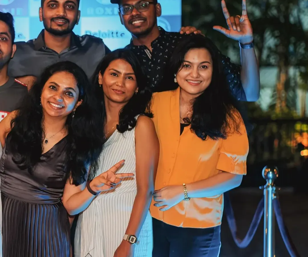 I love seeing my spaces filled with laughter and connection. Here, a corporate team from Deloitte celebrates a milestone, turning a work event into a genuine memory. This is what I do best.