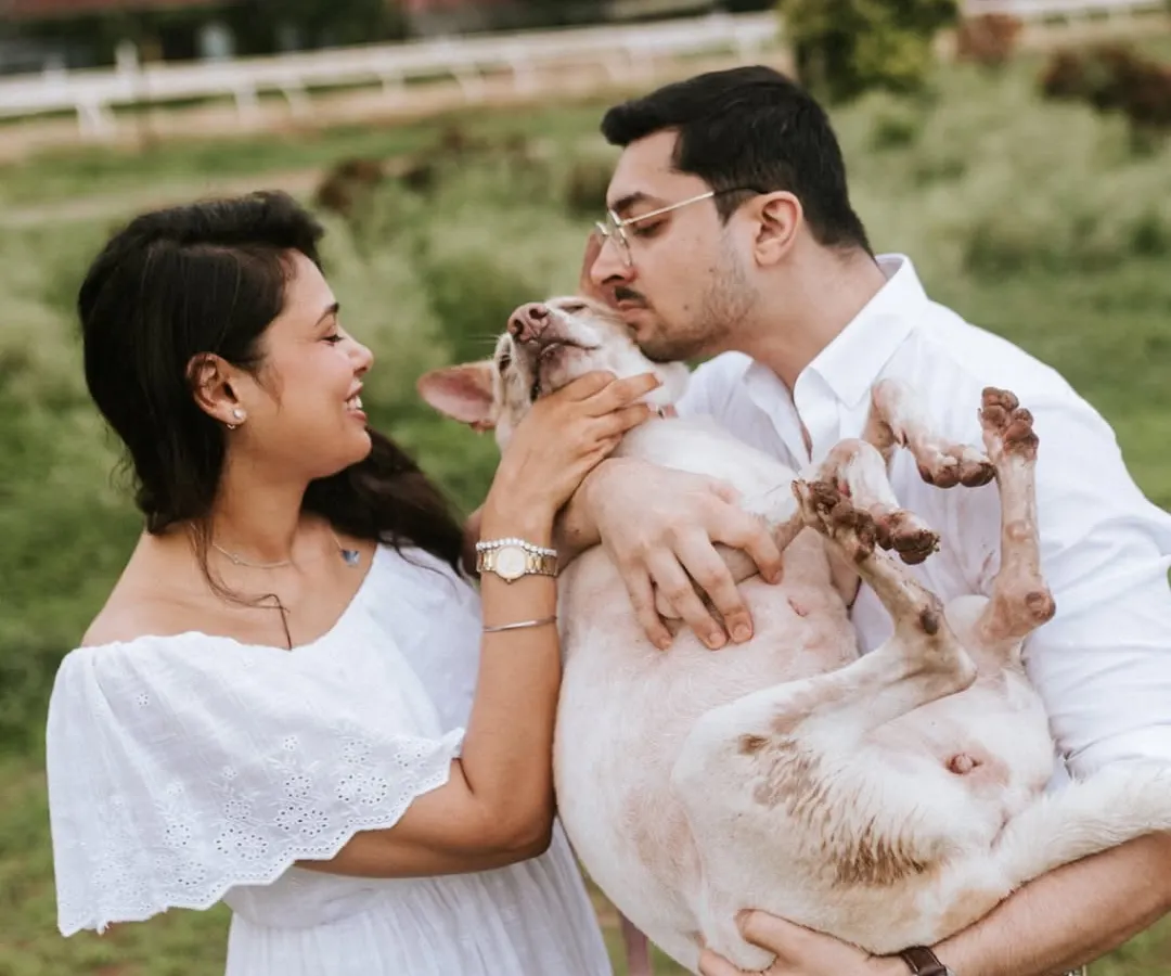 This is what pure happiness looks like. I absolutely love when you bring your furry family members to a shoot. This session in the park was filled with so much love, laughter, and puppy kisses, capturing the couple's bond with their beloved rescue dog.
