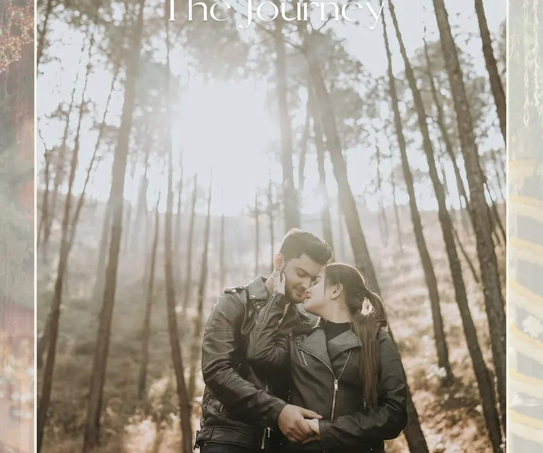 An intimate moment captured amidst the towering pines and misty sunlight of the mountains. This style is perfect for adventurous couples seeking a romantic, nature-filled pre-wedding session in a location like Himachal.