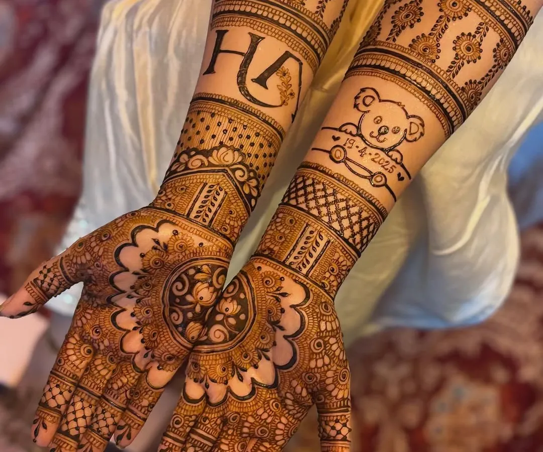 Your mehendi should tell your story. Here, I included the couple's initials and a special teddy bear design to celebrate their journey. I can customize your mehendi with names, dates, or any symbol that's meaningful to you.