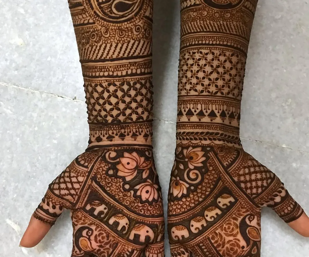 I feel so proud when I see the work my students create. This is a full bridal mehndi design, complete with intricate details like elephants and peacocks, all done by one of my talented daughters after taking my course.