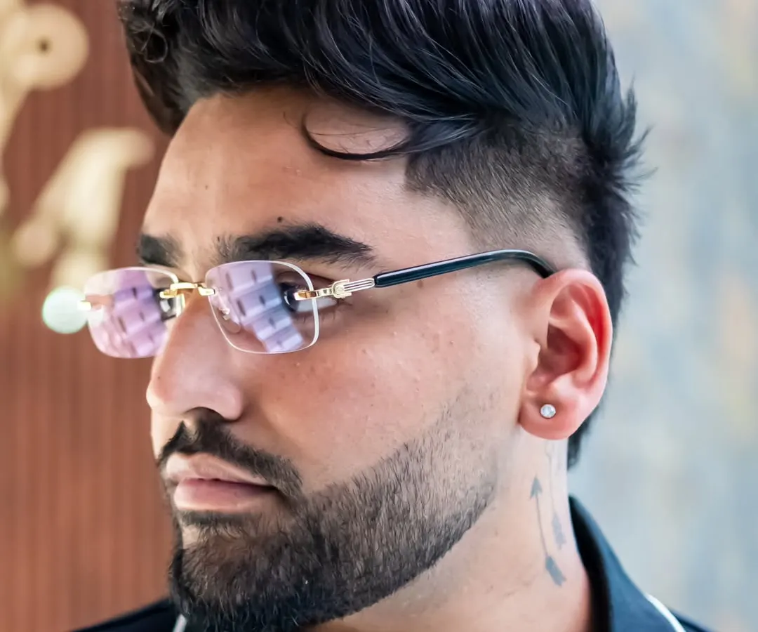 It is more than a haircut, it is a statement. We specialize in premium men's grooming, delivering sharp, textured fades and perfectly sculpted styles that are crafted with precision.