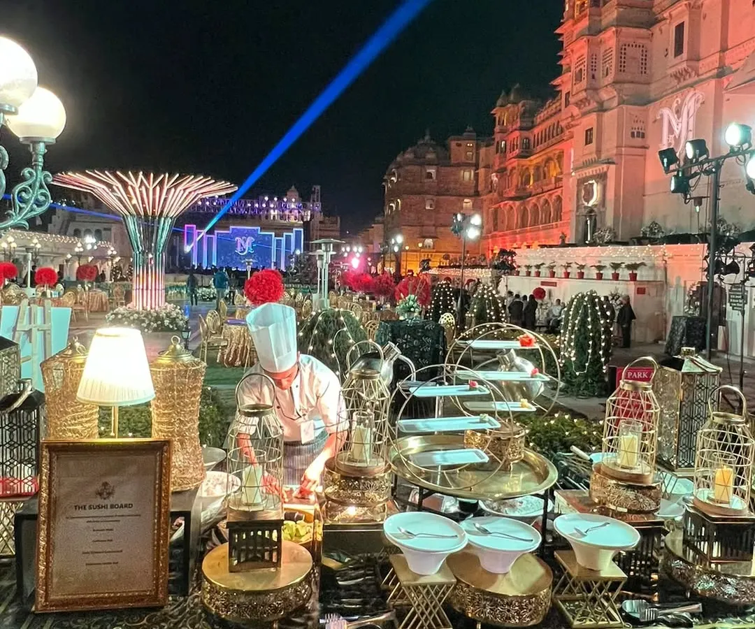 A spectacular wedding buffet set against the royal backdrop of Udaipur's City Palace. Our live stations and elaborate displays are designed to match the opulence of the venue, providing a feast fit for royalty at this grand destination wedding.