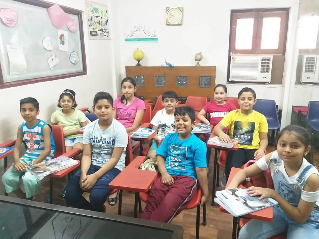A snapshot of one of our kids' batches in our Rohini classroom. We intentionally keep our class sizes small to ensure every child receives individual attention from our experienced faculty, creating a comfortable and effective learning environment for all.