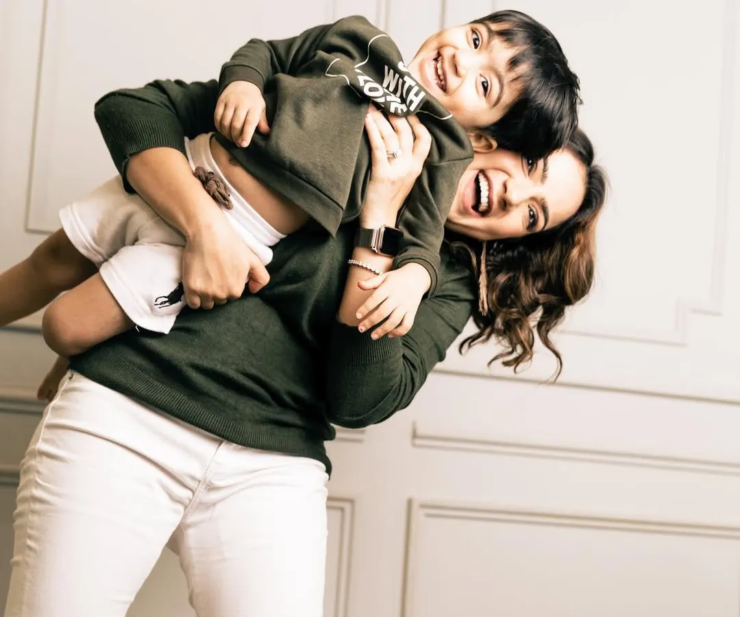 The pure, uncontainable joy of a mother playing with her son. My sessions are filled with movement and laughter like this, where I step back and let your natural connection shine through.