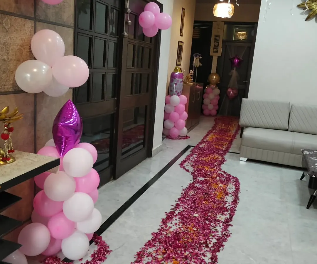 To make the baby's first steps into the home truly special, I design beautiful entrance pathways using fresh rose petals. This adds a traditional and elegant touch to your welcome baby ceremony, creating a memorable moment for the whole family.