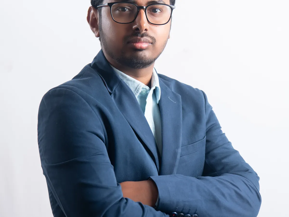 Our studio sessions offer great versatility. Here, we used a clean white background and a confident pose to create a sharp, modern professional portrait that stands out. We work with you to find the pose and backdrop that best represents your brand.