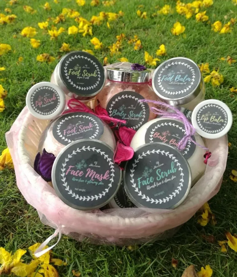 A basket full of my handmade skincare goodies. You can see my lip scrubs, face masks, body scrubs, and foot balms all ready to go. Each product is made with 100% natural ingredients to nourish your skin from the outside in.