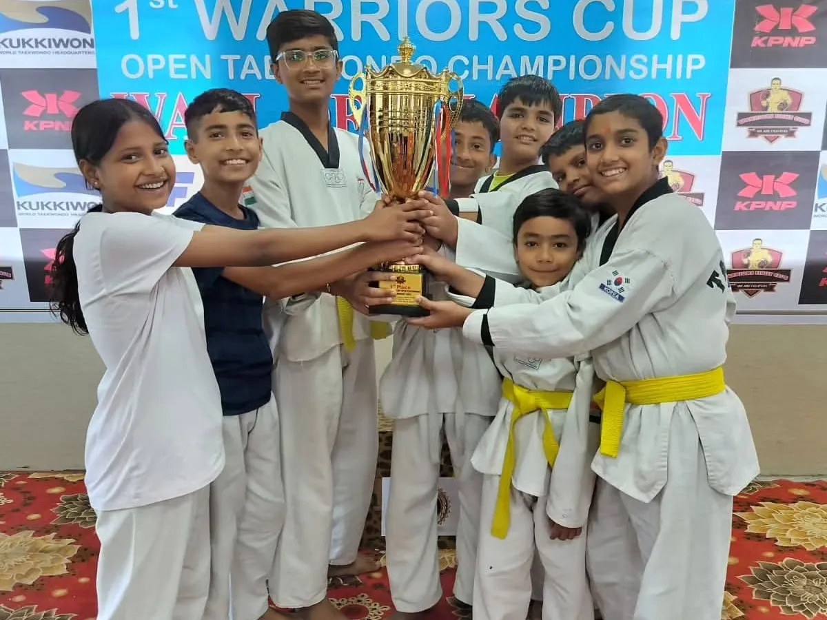 The pure joy of a team victory. Here, our young champs celebrate winning the overall trophy at the 1st Warriors Cup Open Taekwondo Championship. This is what our family spirit is all about.
