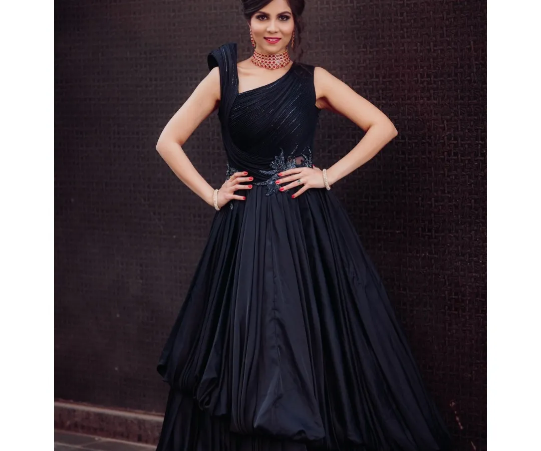 For a glamorous reception or cocktail party, a look like this makes a statement. I created a sophisticated smokey eye and a polished updo to pair with her elegant black gown, ensuring she looked and felt incredible all night long.